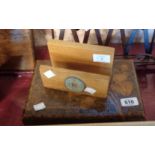 A carved wooden sewing box and contents - sold with a Chinese coin set wooden letter rack