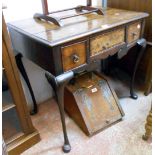 A 76cm antique oak and crossbanded lowboy with three frieze drawers and shaped apron, set on slender