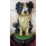 A reproduction painted cast iron collie dog doorstop