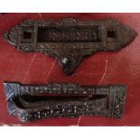 Two vintage cast metal letterboxes in the Victorian style