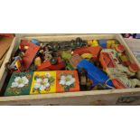 A vintage suitcase containing a German wooden elephant by Berhofa, building blocks, wooden train,