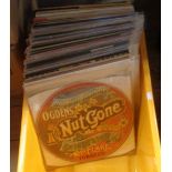 A collection of vintage vinyl LP records including Small Faces, Simon & Garfunkel, The Band, Ella