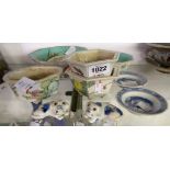 Nine pieces of 19th Century Chinese porcelain including a pair of small reclining dogs, bowls, etc.
