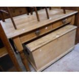 A 1.2m Victorian pine farmhouse kitchen table with two frieze drawers, set on animal damaged