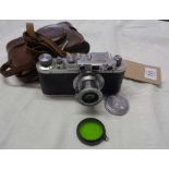 A 1937 Leica II Range Finder camera, serial number 241958, with additional green filter and original