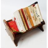 A small vintage oak sloping book rack containing Observer's titles, A Little Book of Rhymes New