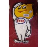 A reproduction painted cast metal Esso Mr Drip sign