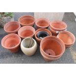 A selection of medium size mainly terracotta garden pots - various condition