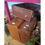 Three vintage leather suitcases with various contemporary labels