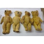 A box containing four of old Teddy bears - various condition