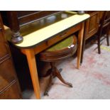 A 91cm retro Formica top kitchen table with frieze drawer, set on moulded square tapered legs