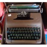 A cased Smith Corona Sterling typewriter