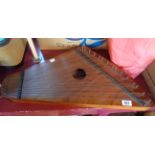 A fifteen string box zither