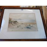 H. Percy Heard: a gilt framed watercolour, depicting sand dunes with buildings on a headland in