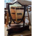 A Georgian style mahogany and strung platform dressing table mirror with shield shaped plate and