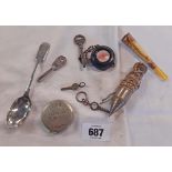 Assorted collectables including advertising tape measures, plumb bob, watch keys, etc.
