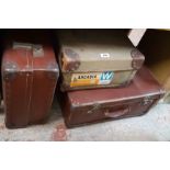 A vintage Tizlite aluminium bound suitcase - sold with Beales of Bournemouth suitcase with leather