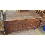 A 1.22m antique oak twin panel front coffer - incised initials DH, remains of baseboards and