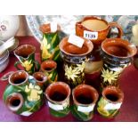 A quantity of pottery including Torquay Watcombe vases Longpark daffodil vases, Doulton Harvest jug,