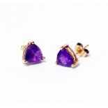 A pair of marked 375 amethyst stud ear-rings