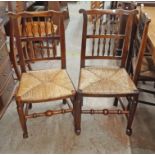 A harlequin set of eight antique elm and ash spindle back Lancashire chairs with woven rush seats