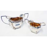 A matching silver cream jug and sugar bowl with gilt interiors - Birmingham 1911