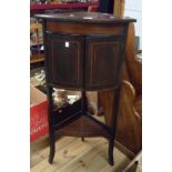 A 51cm Edwardian mahogany and strung freestanding corner cabinet with pair of decorative bow front