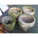Three concrete garden urns with swag decoration - sold with a concrete strawberry pot
