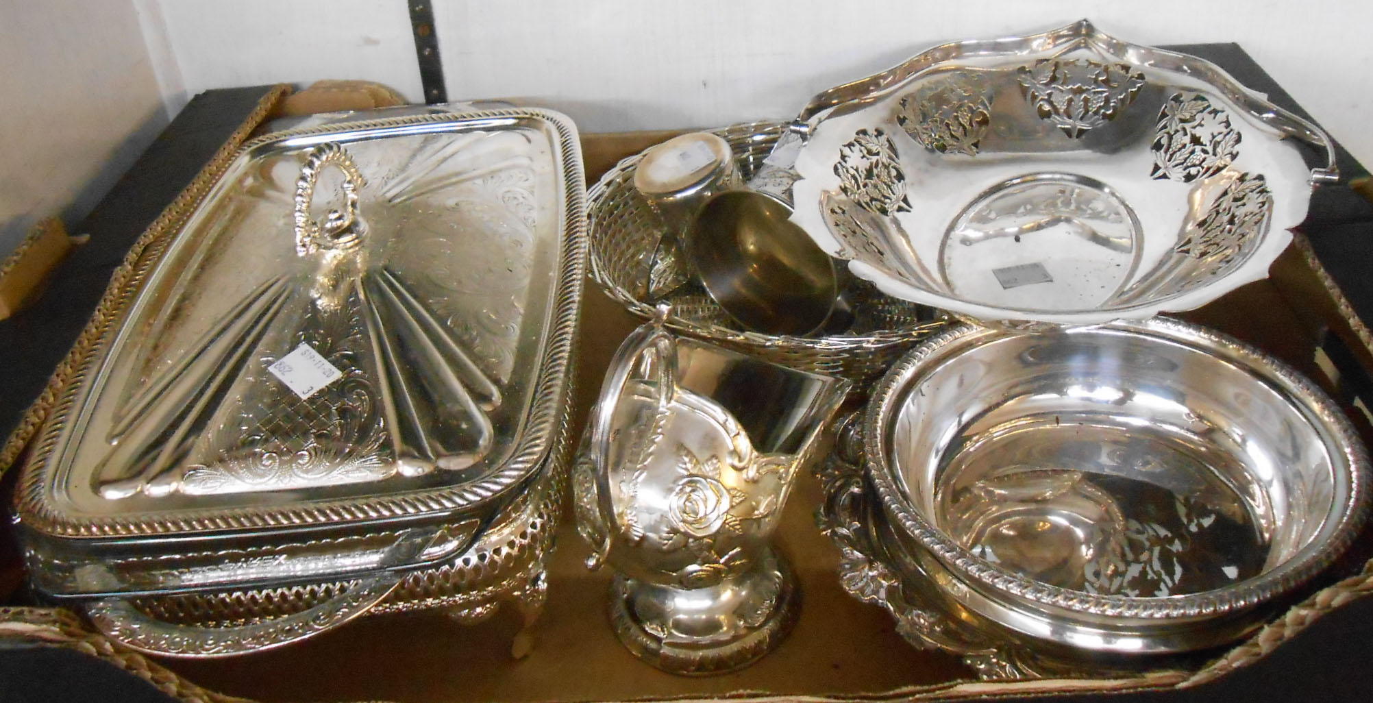 A quantity of silver plated items including vegetable dish, other dishes and woven basket, etc.