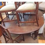 A Victorian oak and mahogany D-end draw frame extending dining table with two leaves, set on