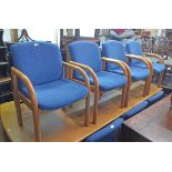 A set of ten late 20th Century polished wood framed waiting room elbow chairs with upholstered backs