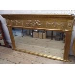 A 102cm Georgian style gilt plaster framed overmantle mirror with cherubs and swag decoration,
