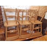 A set of six modern C.P.W. blonde wood Windsor style kitchen chairs with solid sectional seats and