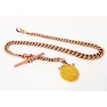 A hallmarked 9ct. rose gold graduated kerb-link Albert watch chain, set with a solder mounted and