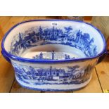 A modern reproduction blue and white china footbath