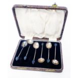 A cased set of six silver coffee bean spoons - one a/f