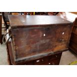 An 80cm antique mahogany and mixed wood trapezoid shaped maritime chest with lift top enclosing
