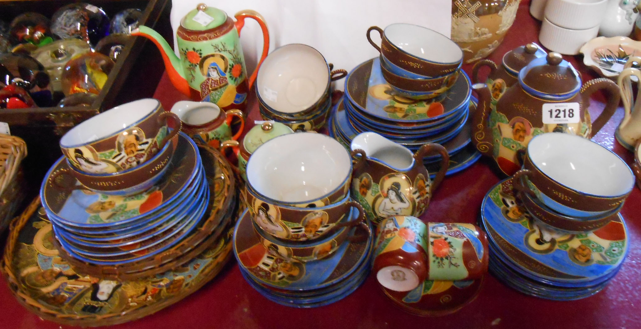 A Japanese moriage porcelain twelve place tea service - sold with a similar part coffee service