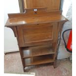 An 84cm early 20th Century stained oak student's fall front bureau/desk with simple pigeon hole