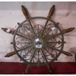 A late Victorian ornate brass ship's wheel - one section missing