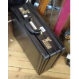 An old black briefcase