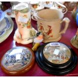 Two framed Prattware potlids, The Village Wedding and another - sold with a Staffordshire frog