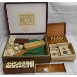 A vintage table tennis set, card games, dominoes, travelling chess set, etc.