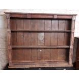 A 1.53m part stripped antique pine three shelf open bookcase - for restoration