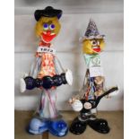 Two Murano clowns playing musical instruments with original labels - one a/f