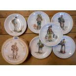 A set of six French porcelain plates depicting street vendors in original wooden box