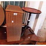 A vintage Lloyd Loom laundry basket with original finish - sold with a modern pedestal wine table