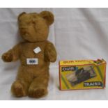 A vintage boxed Our Trains jigsaw and a Teddy bear