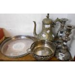 A pair of silver plated candlesticks, ornate coffee pot, gallery tray and pierced dish