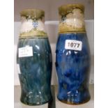 Two similar Doulton Lambeth stoneware vases decorated in the Art Nouveau style - one with old chip